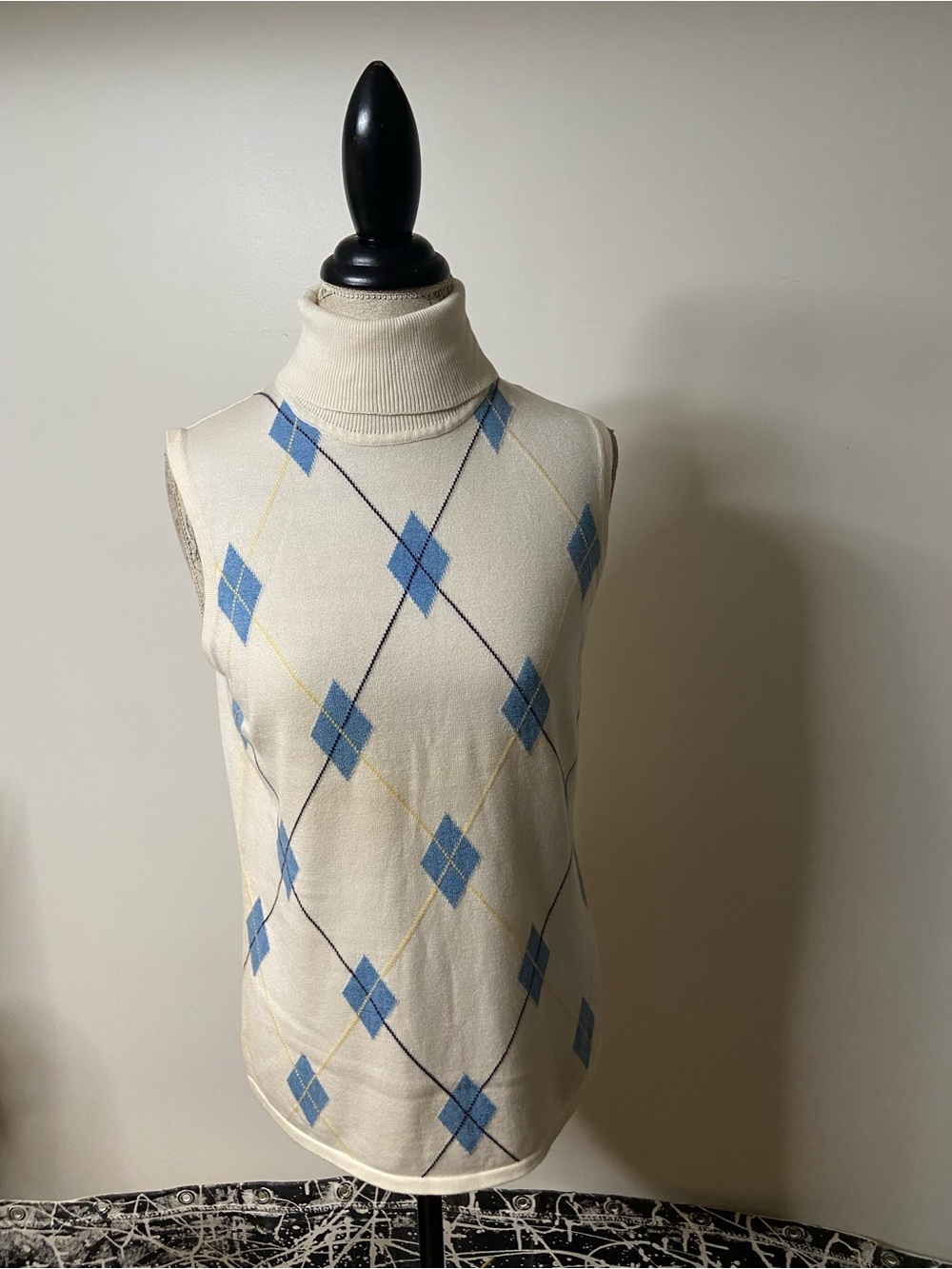 Izod Cream Sleeveless Turtleneck Sweater with Blue Argyle
